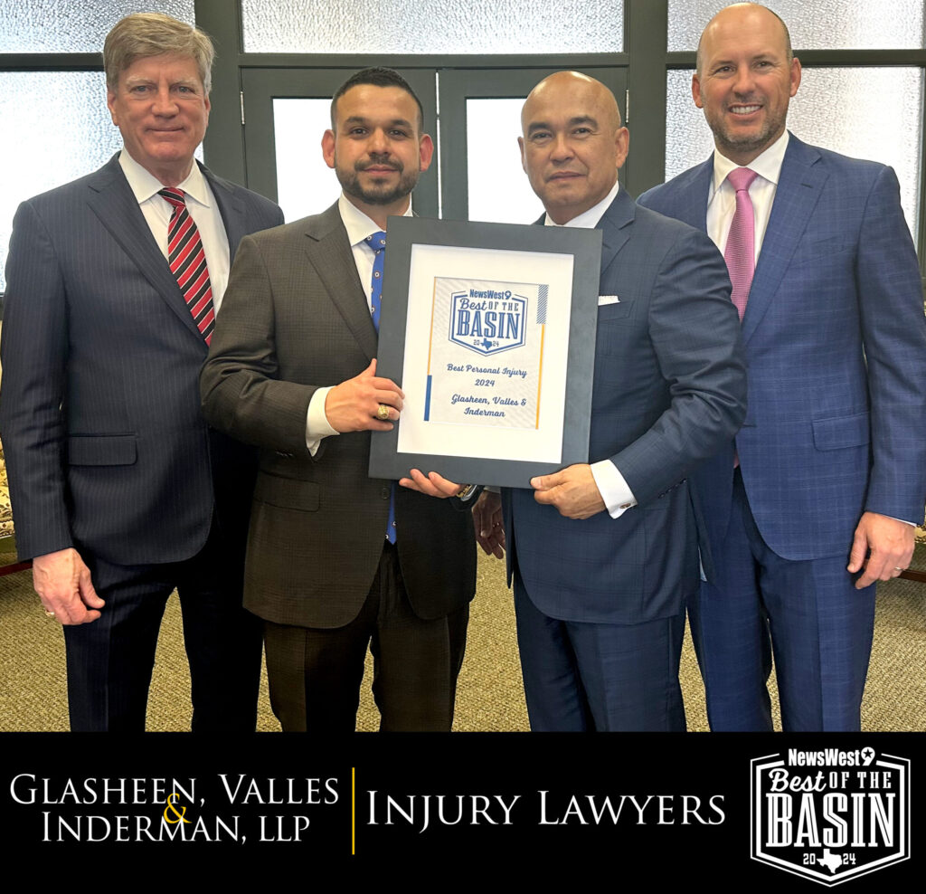 Left to Right: Kevin Glasheen, Pedro Leyva, Noe Valles, Chad Inderman holding a certificate stating, Glasheen, Valles & Inderman Injury Lawyers have been recognized as Best Law Firm in the Permian Basin for 2024