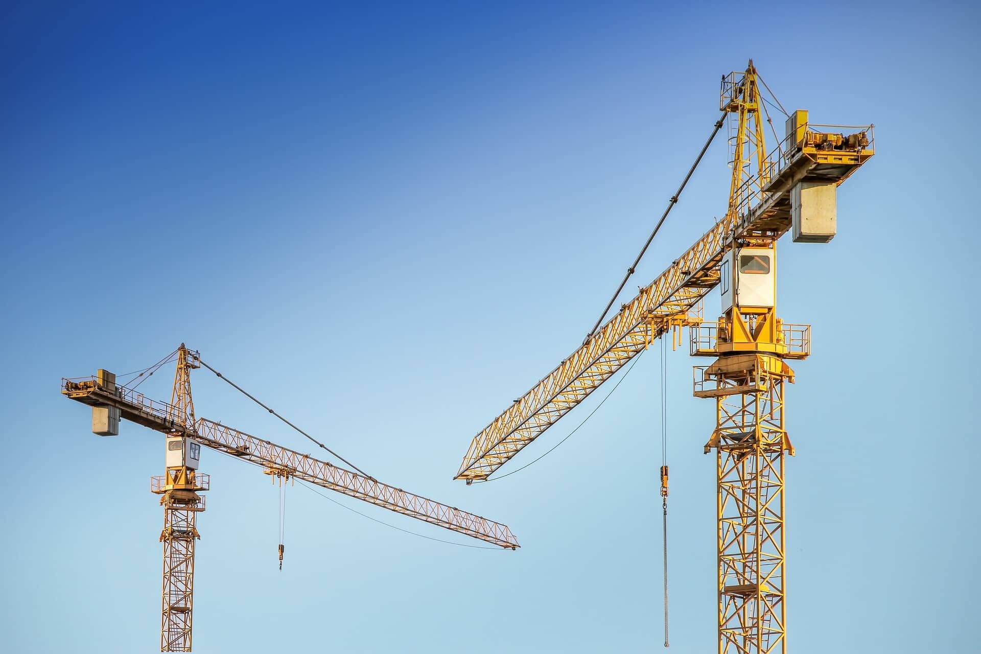 Two cranes | Picture used for Glasheen, Valles & Inderman Injury Lawyers | Lubbock Construction Injury Attorney Page