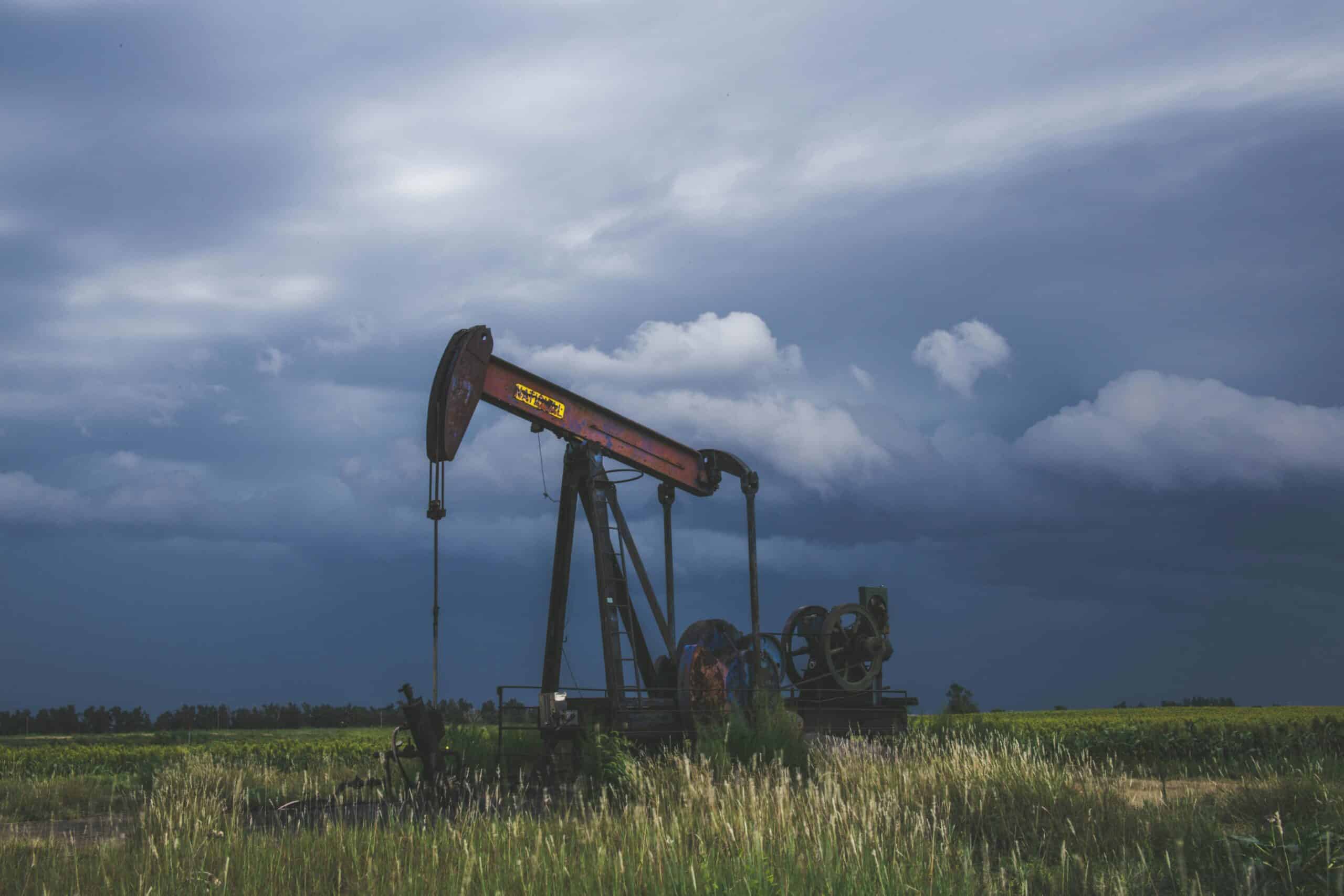 Oil pump silhouettes a stormy back ground used for Glasheen, Valles & Inderman Injury Lawyers | Albuquerque Oilfield Injury Attorney Page